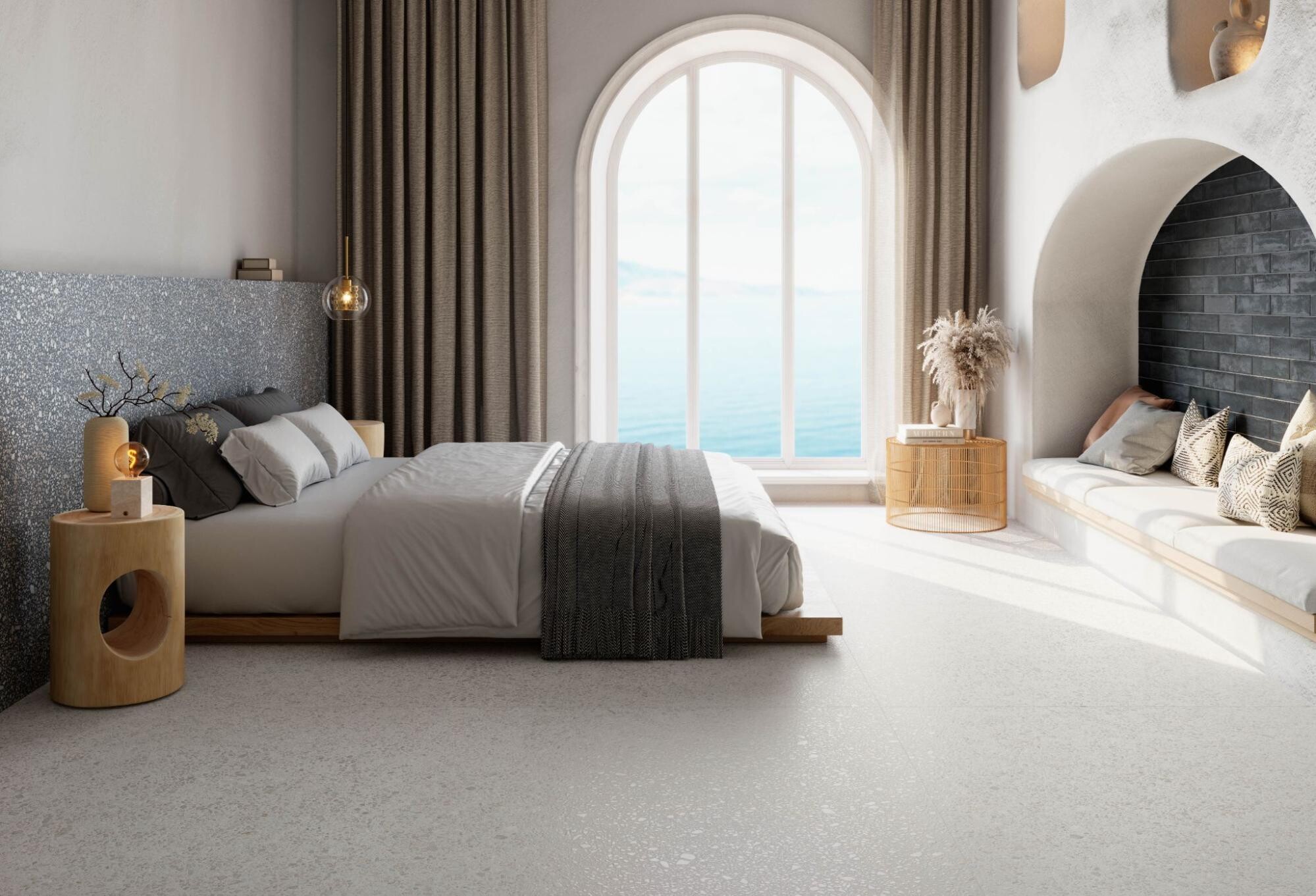 Dormitorio de estilo mediterr&aacute;neo en tonos blancos con vistas al mar